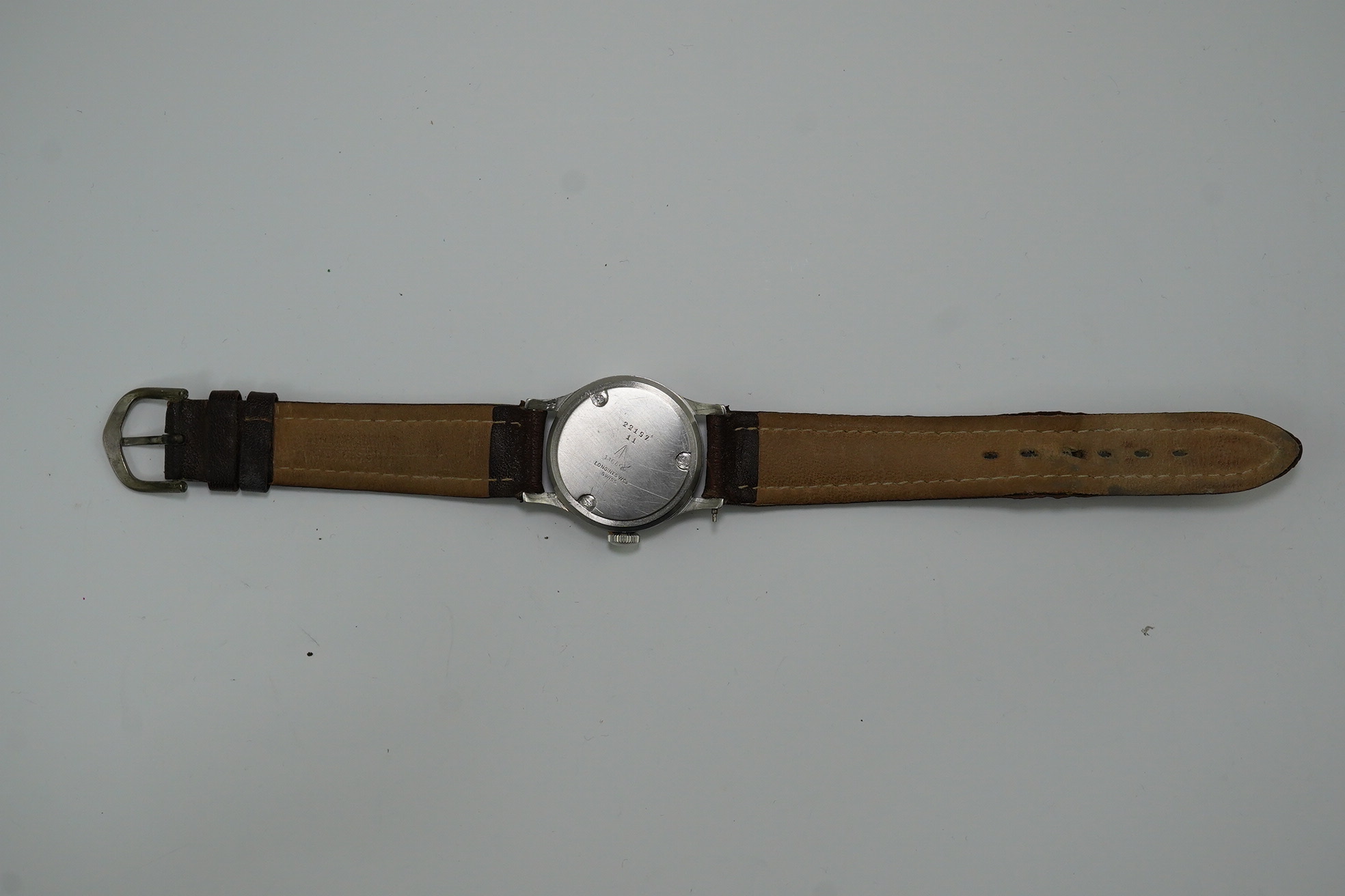 A gentleman's mid 1940's steel Longines military manual wind wrist watch